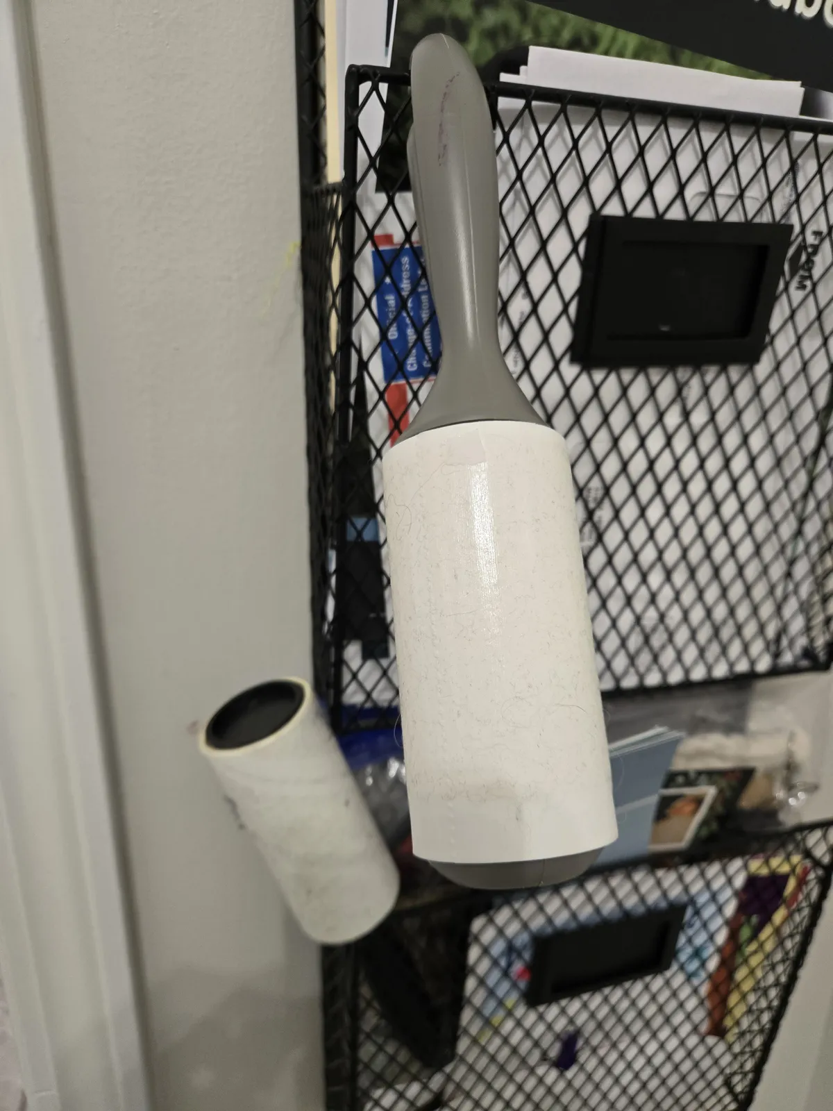 Our lint roller and spare refill — these live by the front door and get used every single morning