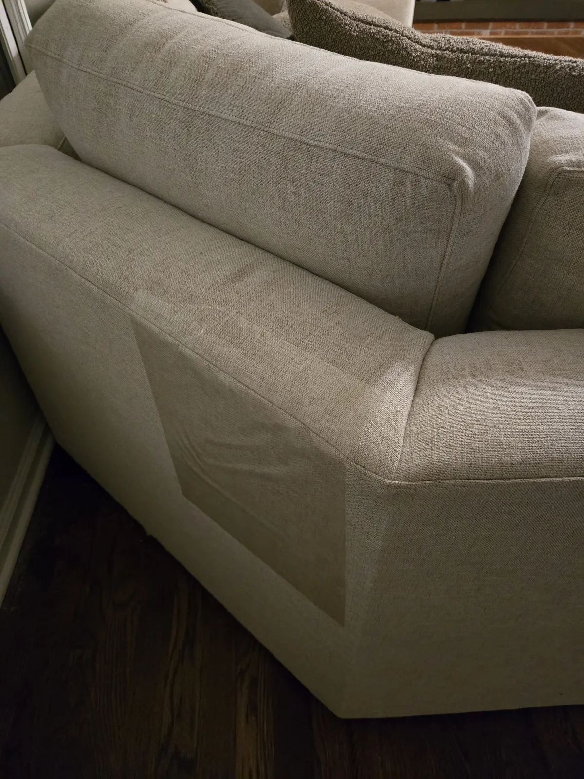 Clear sticky sheets applied to the corner of our couch — nearly invisible but cats hate stepping on them