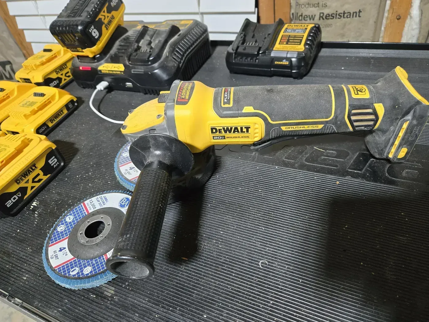DeWalt FLEXVOLT angle grinder with a Benchmark zirconia flap disc mounted