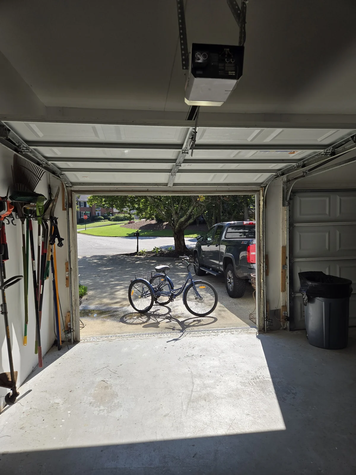 The garage, door up — every joint where framing meets masonry along that opening is a candidate for the foam pass