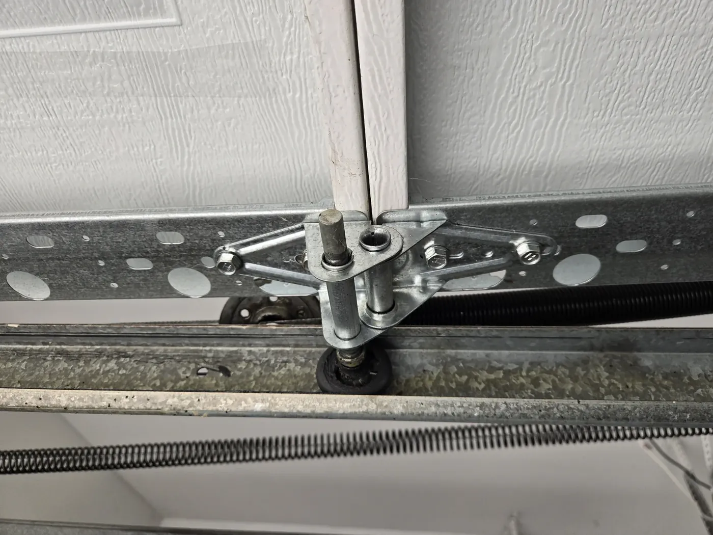 Roller in the track — the bearing gets lubricated, the track just gets wiped clean