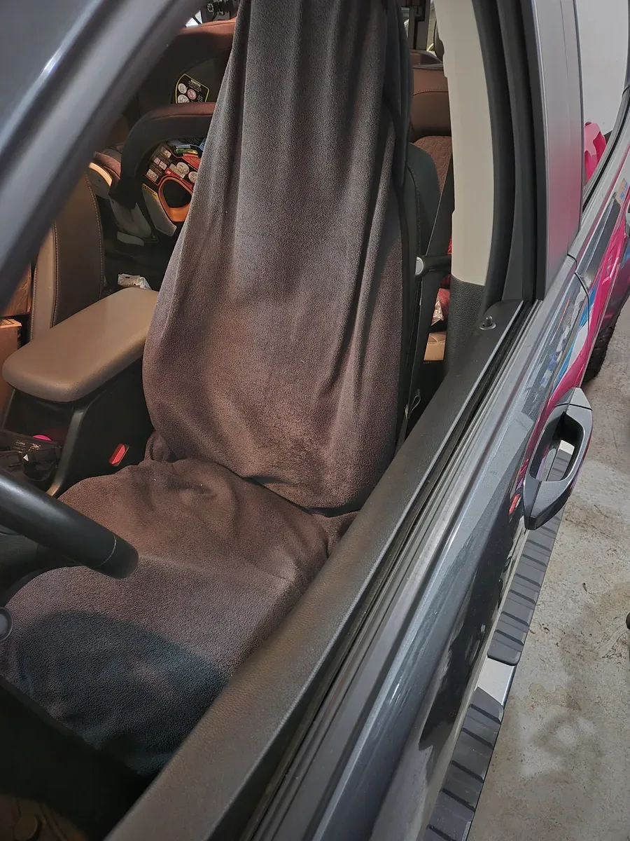 Waterproof seat cover on my truck — saves the upholstery after sweaty or rainy rounds